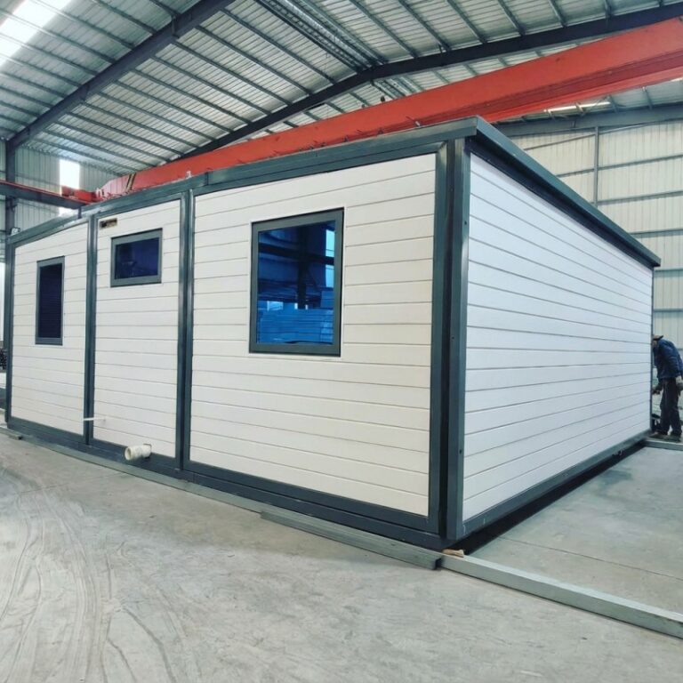3 bedroom expandable container house with modern design, featuring large windows and a sturdy steel frame, manufactured by a professional container house factory in China. Ideal for residential use or as a temporary housing solution.