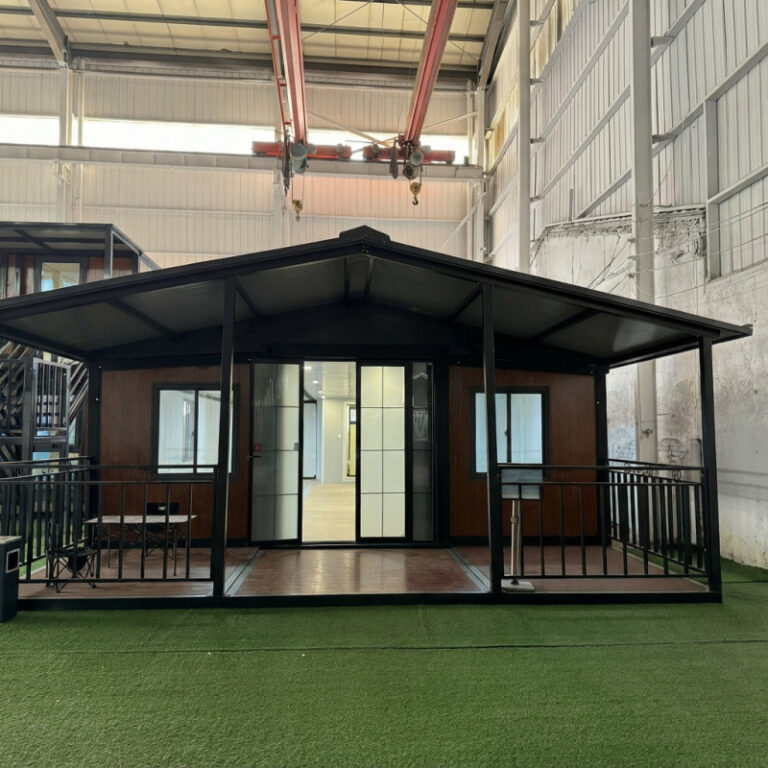 A modern expandable container house with a spacious design and functional layout, showcasing a stylish exterior with large windows and a welcoming front porch, ideal for both residential and commercial uses.