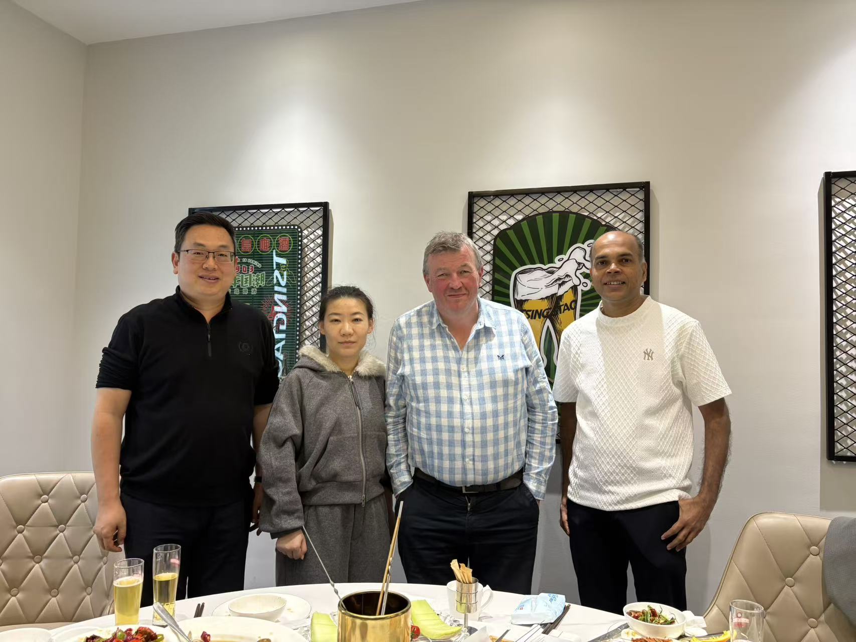 Group photo with the client after the factory visit.